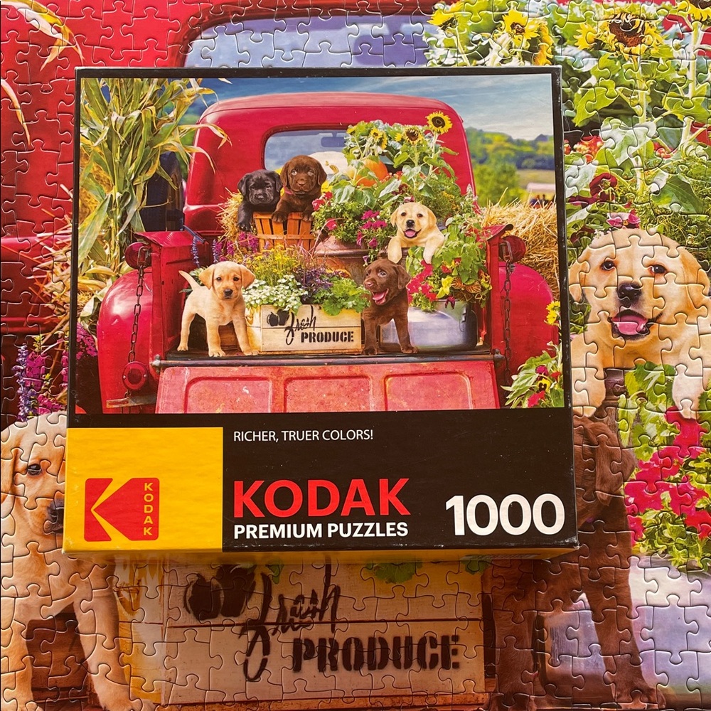 Kodak Premium Puzzle Red Truck with Labrador Puppies and Floral Bounty
